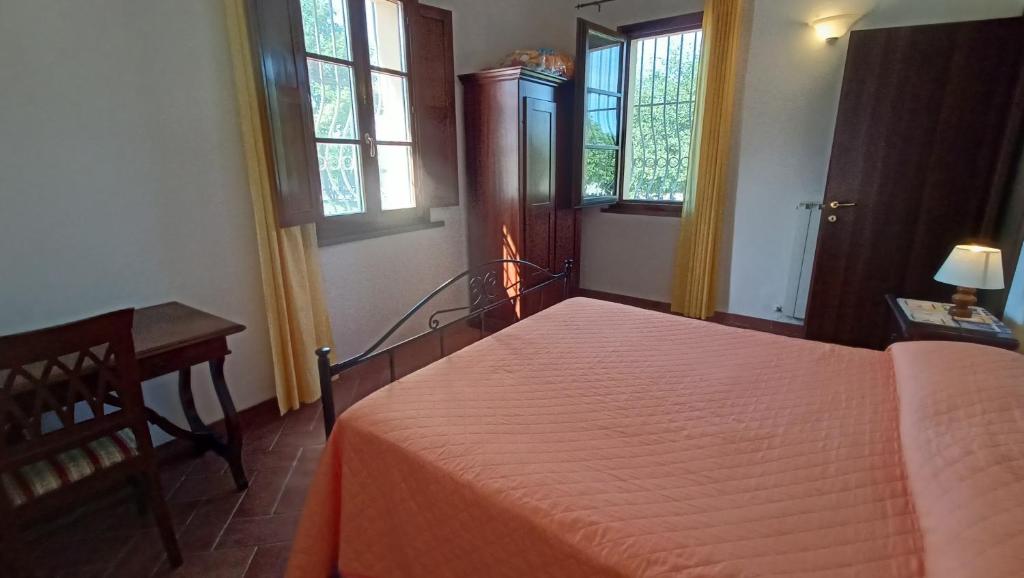 Postel nebo postele na pokoji v ubytování il Chiassetto Agriturismo No Kids