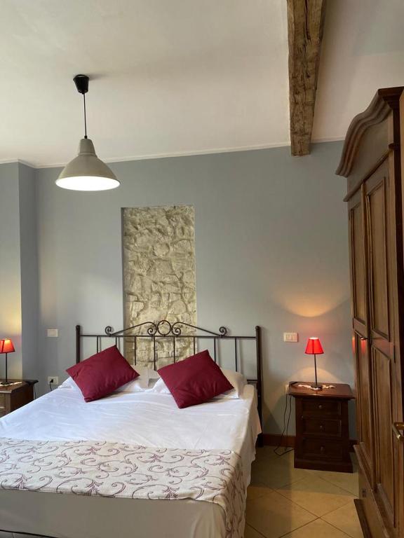 Posteľ alebo postele v izbe v ubytovaní Casa Vacanze La Villetta