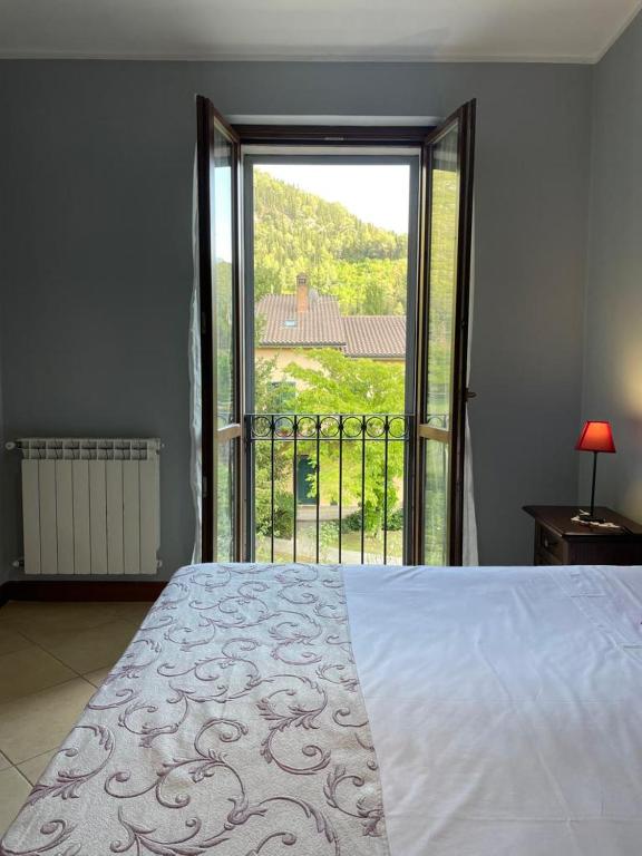 Posteľ alebo postele v izbe v ubytovaní Casa Vacanze La Villetta