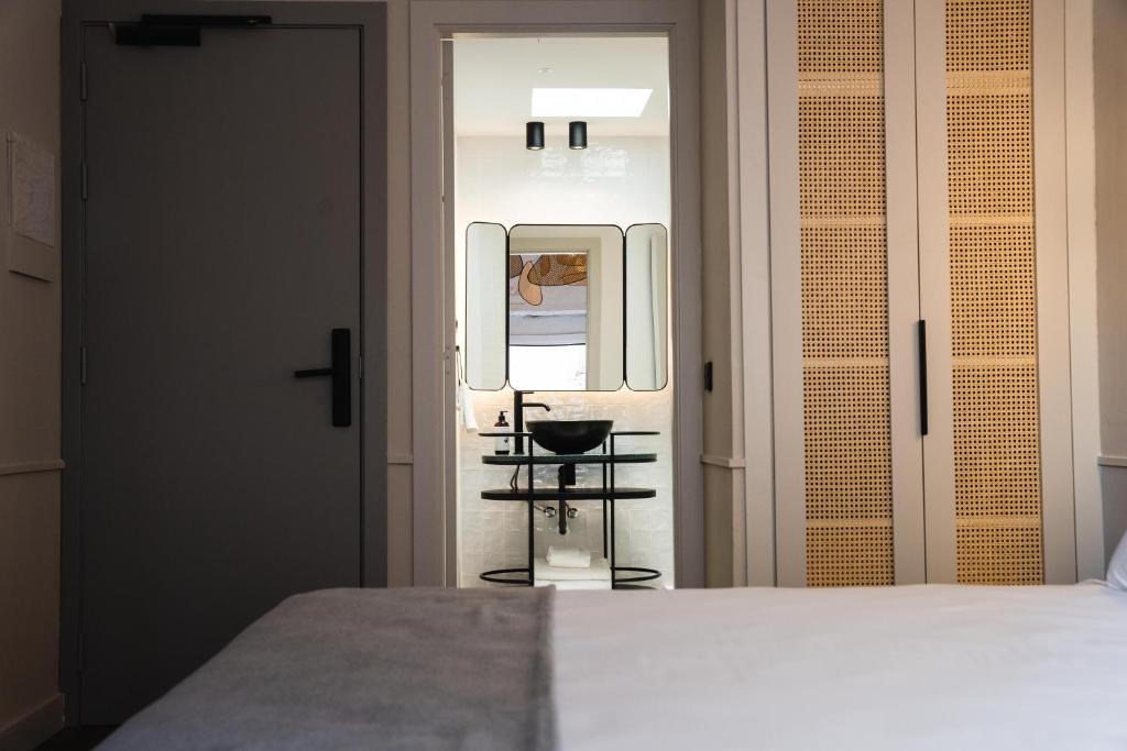 Posteľ alebo postele v izbe v ubytovaní ORA Hotel Priorat, a Member of Design Hotels