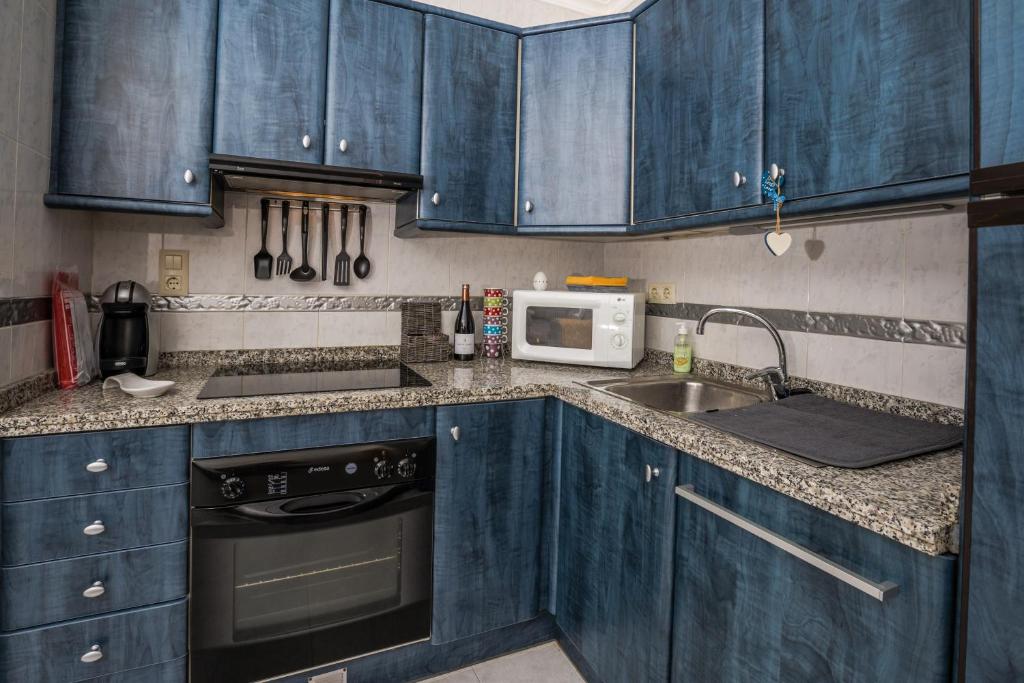 A kitchen or kitchenette at Casa Frederyk