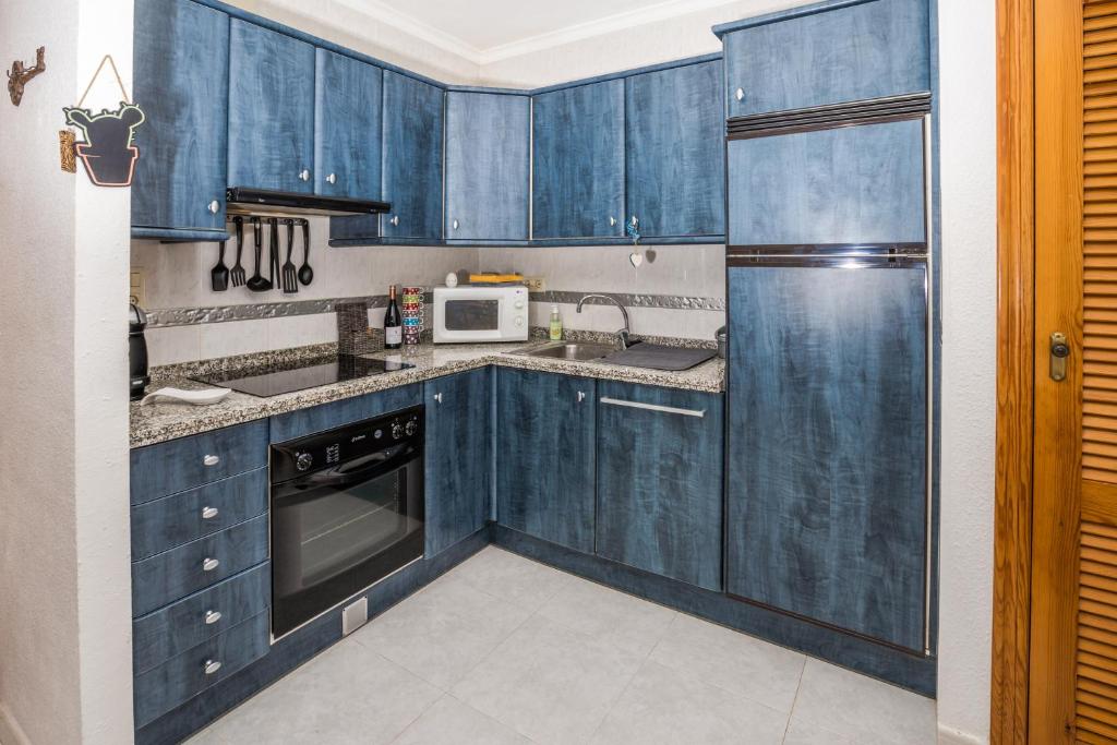 A kitchen or kitchenette at Casa Frederyk
