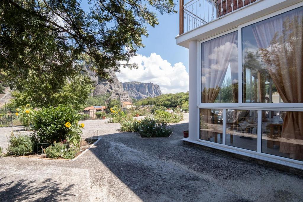 a house with a view of the mountains at Majestic view Home just under Meteora Unesco Site in Kalabaka