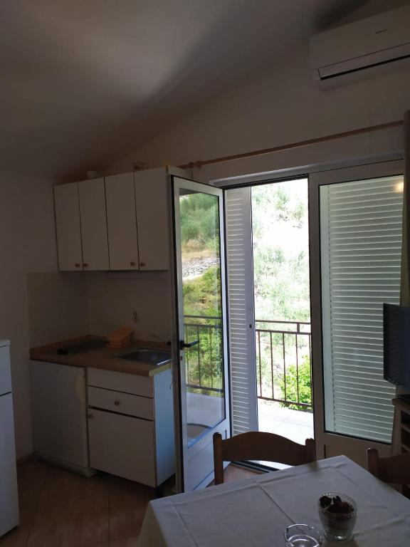 Fotografia z galérie ubytovania Apartmani Raič v Podgore