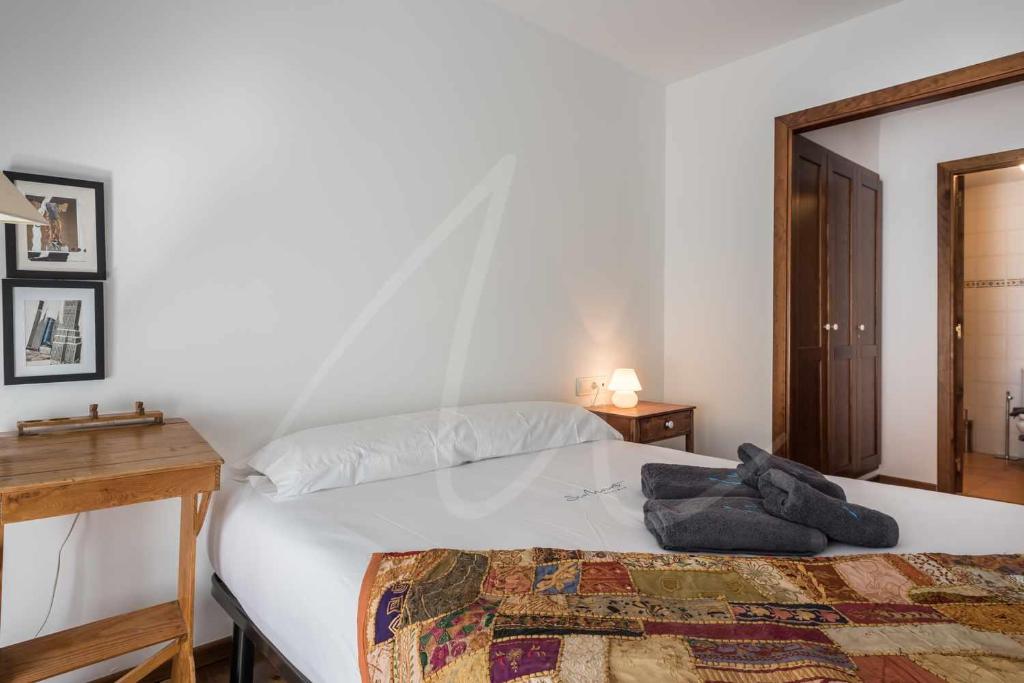Posteľ alebo postele v izbe v ubytovaní Aiguamoig by SeaMount Rentals