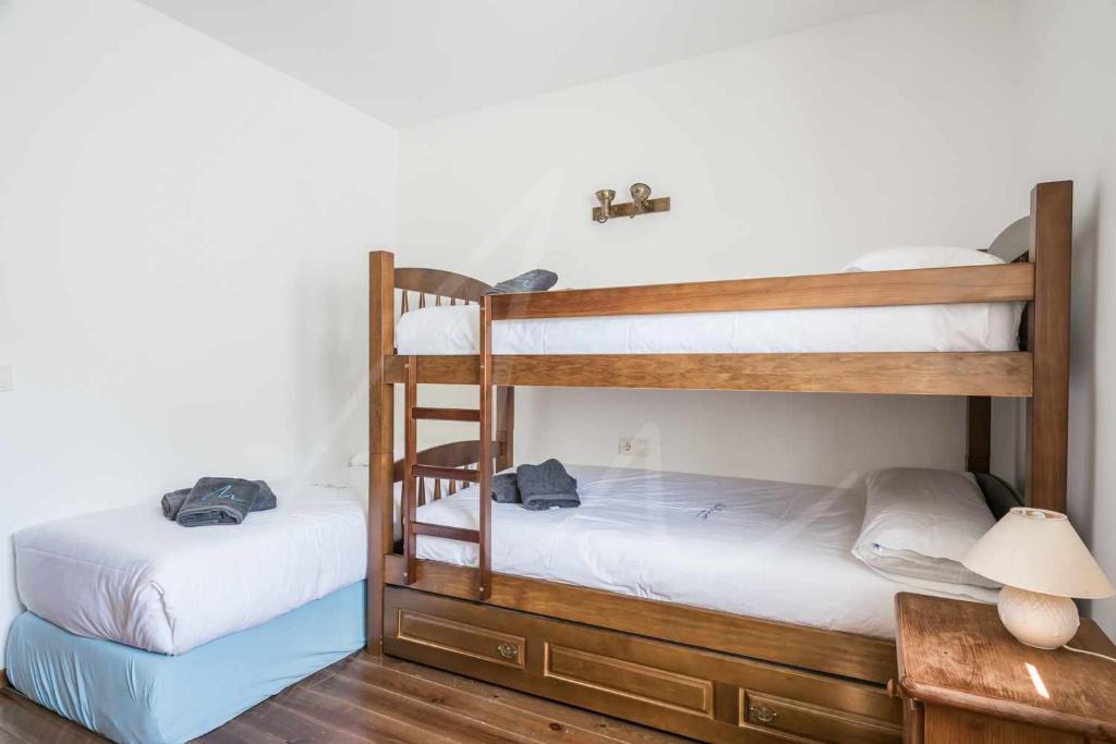 Posteľ alebo postele v izbe v ubytovaní Aiguamoig by SeaMount Rentals