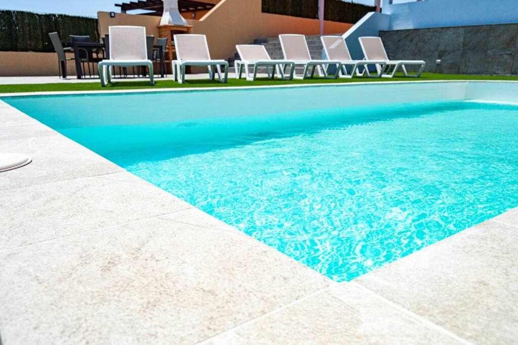 The swimming pool at or close to Villa Mini Golf