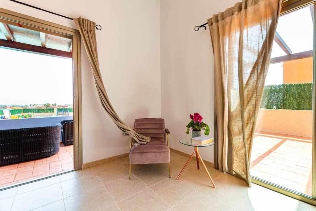 A balcony or terrace at Villa Mini Golf