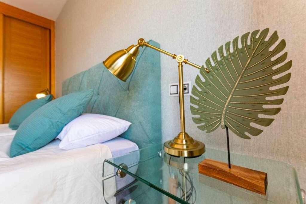 A bed or beds in a room at Villa Mini Golf