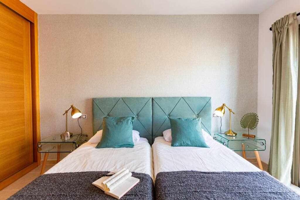 A bed or beds in a room at Villa Mini Golf