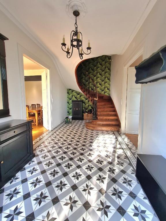 Posteľ alebo postele v izbe v ubytovaní Les Hauts de St Jacques maison d'exception 300m2, jardin arboré 2000m2