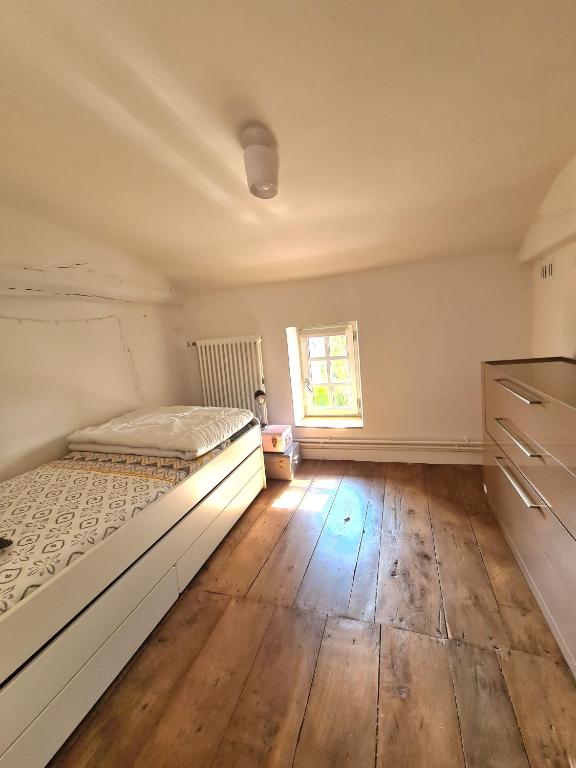 Posteľ alebo postele v izbe v ubytovaní Les Hauts de St Jacques maison d'exception 300m2, jardin arboré 2000m2