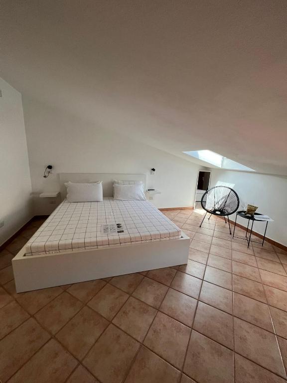 Postel nebo postele na pokoji v ubytování B-Guest House