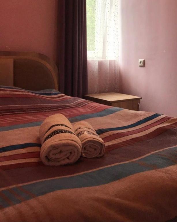 Postel nebo postele na pokoji v ubytování Disney