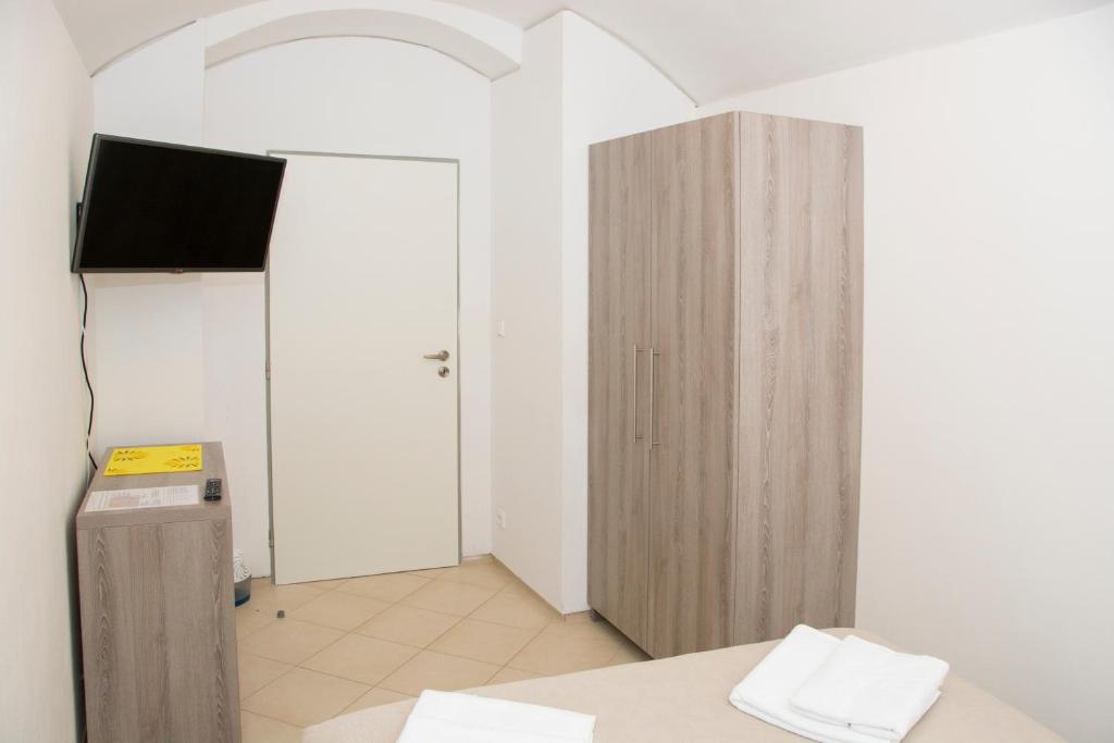 TV a/nebo společenská místnost v ubytování Limes Apartments