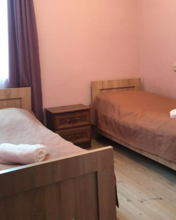 Postel nebo postele na pokoji v ubytování Disney