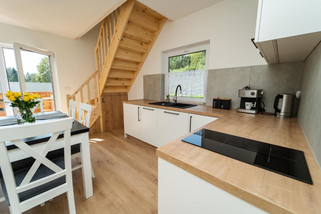 Kuchyň nebo kuchyňský kout v ubytování ApartView House Dolina Partecznik by Rent like home
