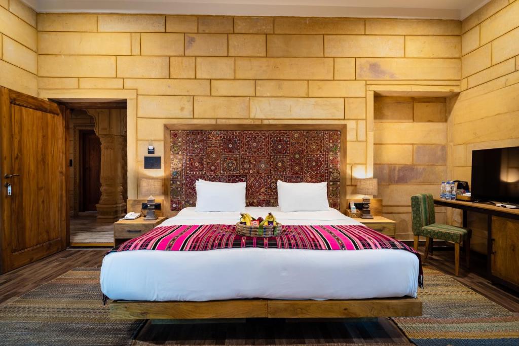 Postel nebo postele na pokoji v ubytování Hotel Grand Khalifa