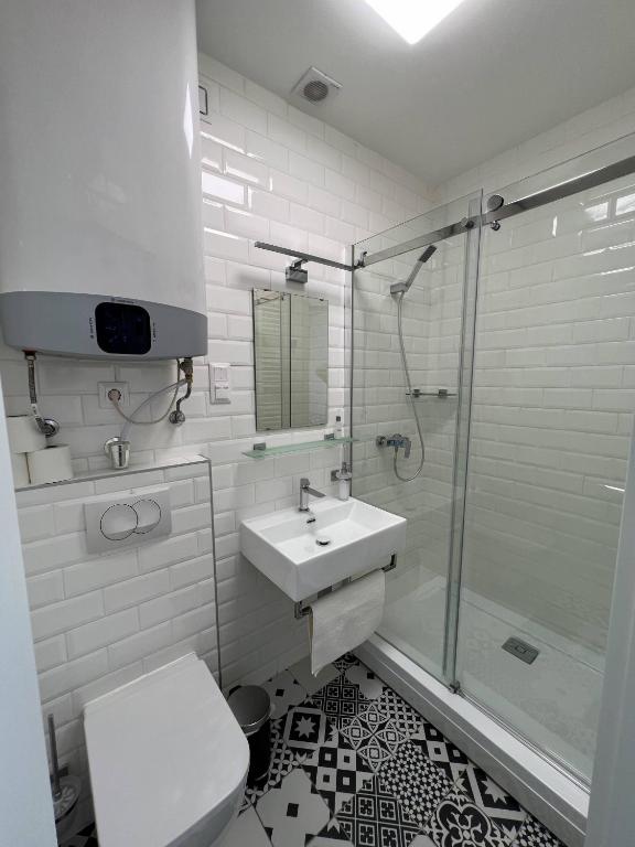 Koupelna v ubytování Lujza Apartman