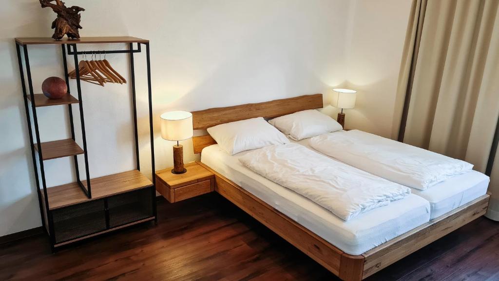 Postel nebo postele na pokoji v ubytování Dill Hotel