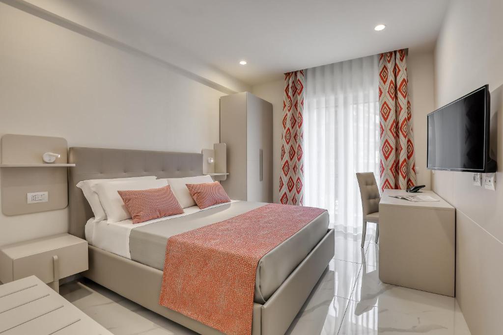 Posteľ alebo postele v izbe v ubytovaní Vomero High Hotel