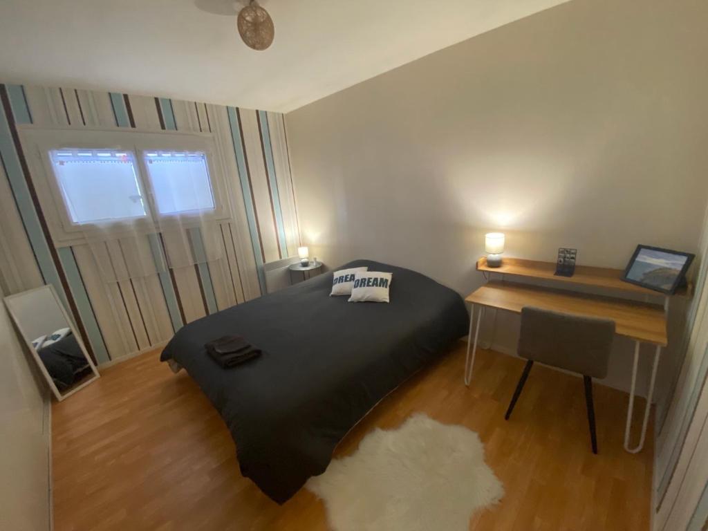 Postel nebo postele na pokoji v ubytování Le gîte de Delphine