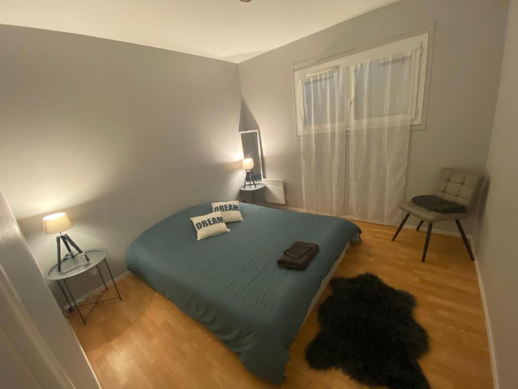 Postel nebo postele na pokoji v ubytování Le gîte de Delphine