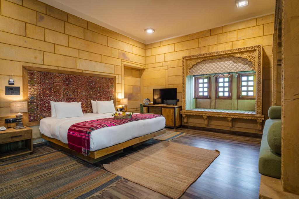 Postel nebo postele na pokoji v ubytování Hotel Grand Khalifa