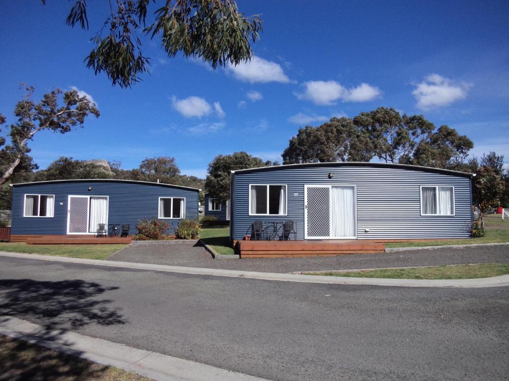 two modular homes on the side of a road at Bicheno East Coast Holiday Park in Bicheno