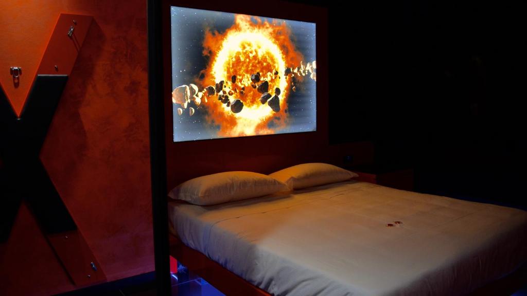 Postel nebo postele na pokoji v ubytování C rooms - Love Motel Monza