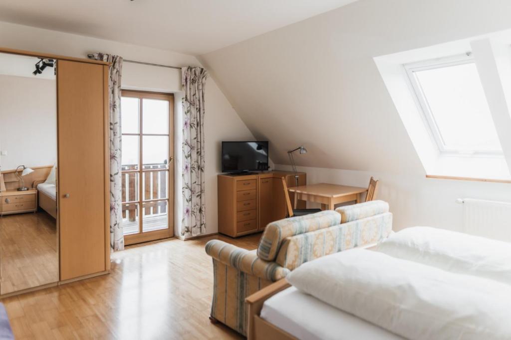 Letto o letti in una camera di Weingut Kögl