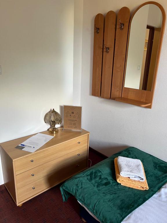 Postel nebo postele na pokoji v ubytování Zajazd Reczyn - Nowy Reczyn 16