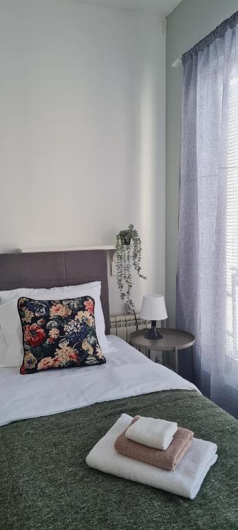 Postel nebo postele na pokoji v ubytování MiniCity Inn