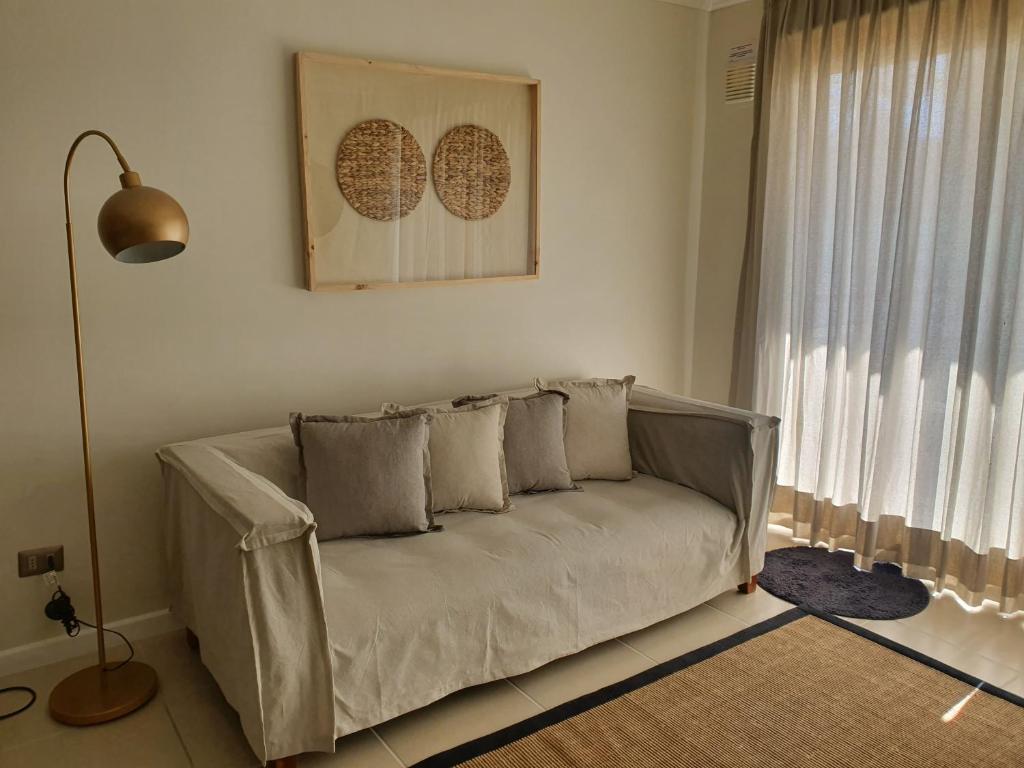 Postel nebo postele na pokoji v ubytování Hermoso Departamento