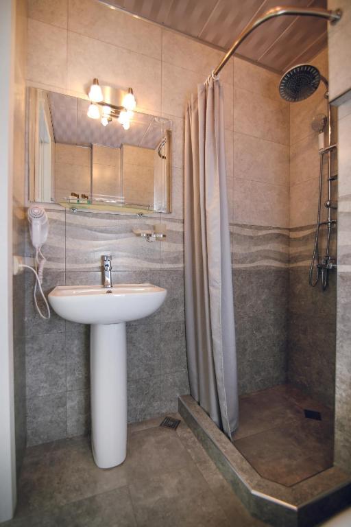 Koupelna v ubytování Hotel Kera