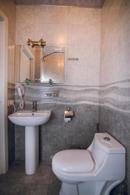Koupelna v ubytování Hotel Kera