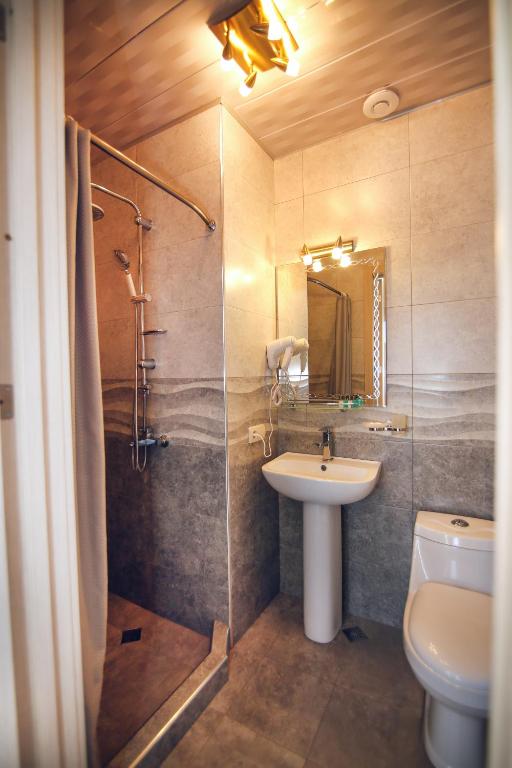 Koupelna v ubytování Hotel Kera
