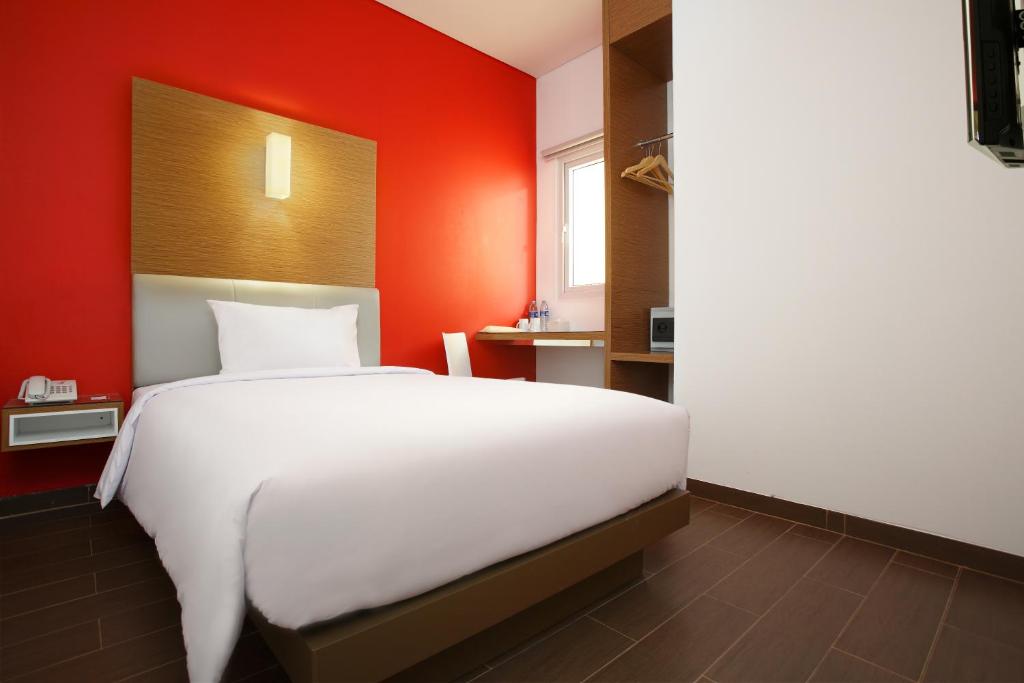 Postel nebo postele na pokoji v ubytování Amaris Hotel Cilegon
