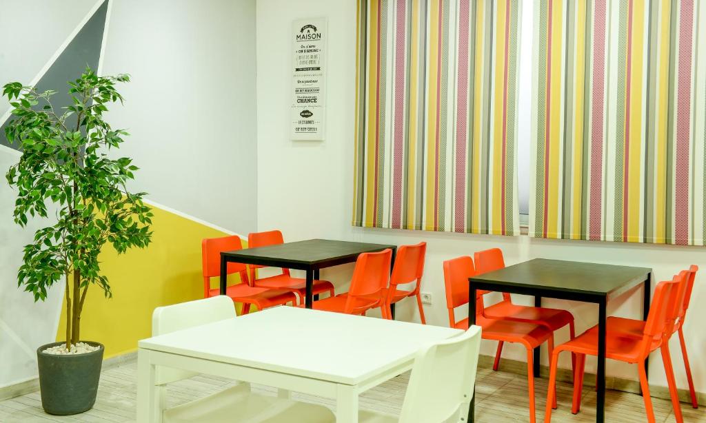 Posezení v ubytování Manzil Hotel