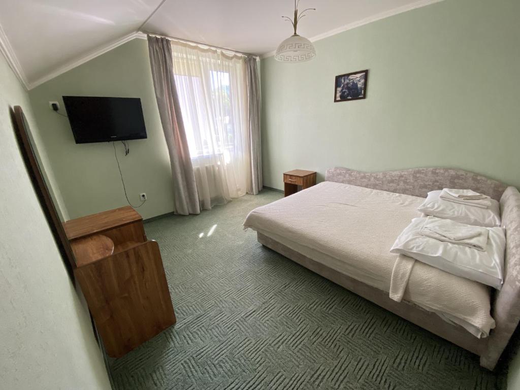 Postel nebo postele na pokoji v ubytování Edelweiss