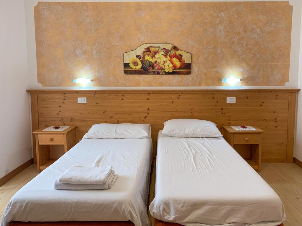 Postel nebo postele na pokoji v ubytování Agritur al Vigneto