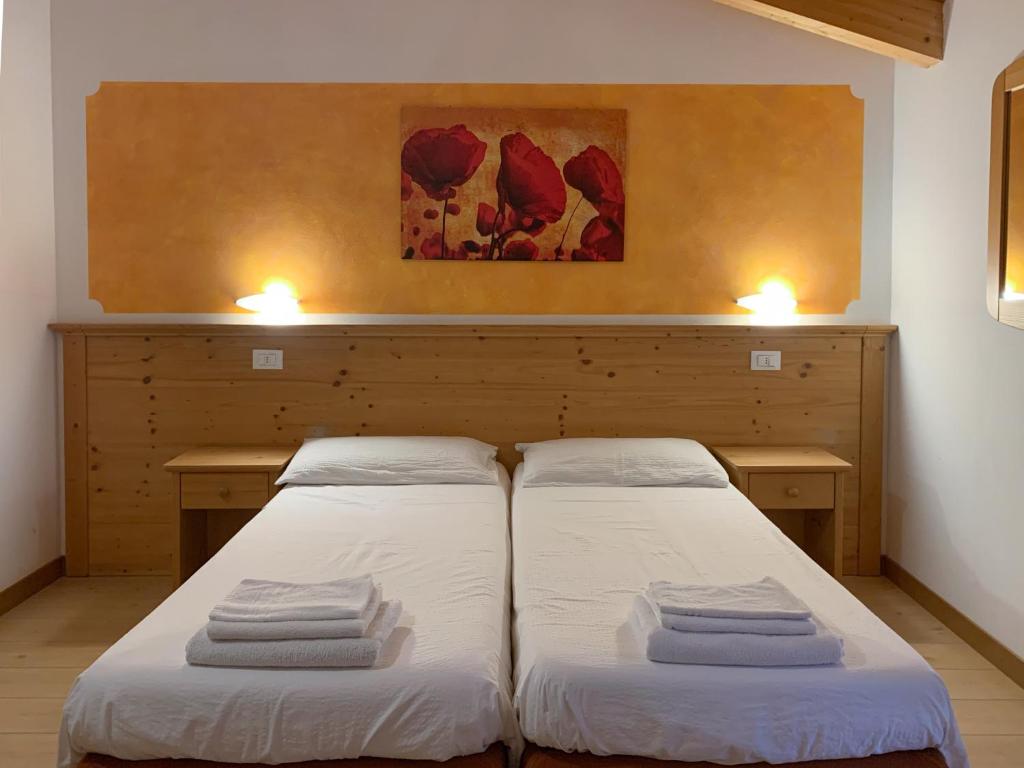 Postel nebo postele na pokoji v ubytování Agritur al Vigneto