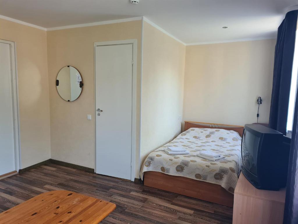 Postel nebo postele na pokoji v ubytování Laine guesthouse