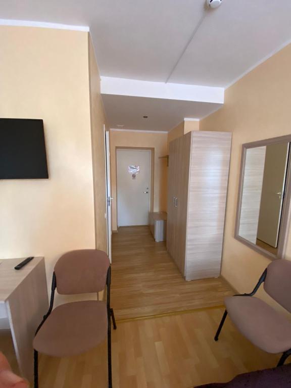 TV a/nebo společenská místnost v ubytování Laine guesthouse