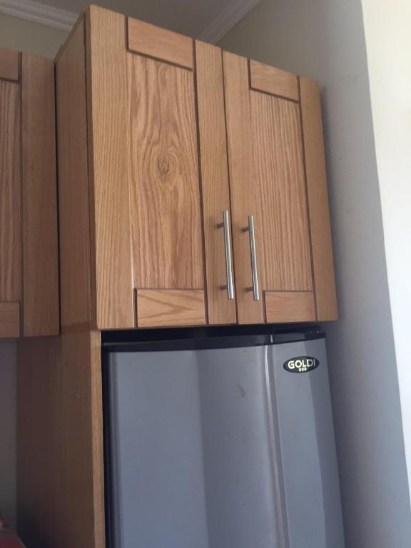 A kitchen or kitchenette at Porto Residence Chalet, Outside Marina Gate 3, Sahel North Coast For Rent - شاليه بورتورسيدنس بخارج بوابة 3 مارينا الساحل الإيجار