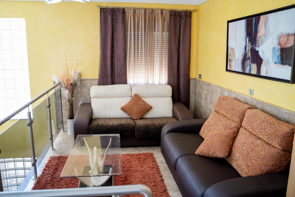 Posezení v ubytování Hotel Malena