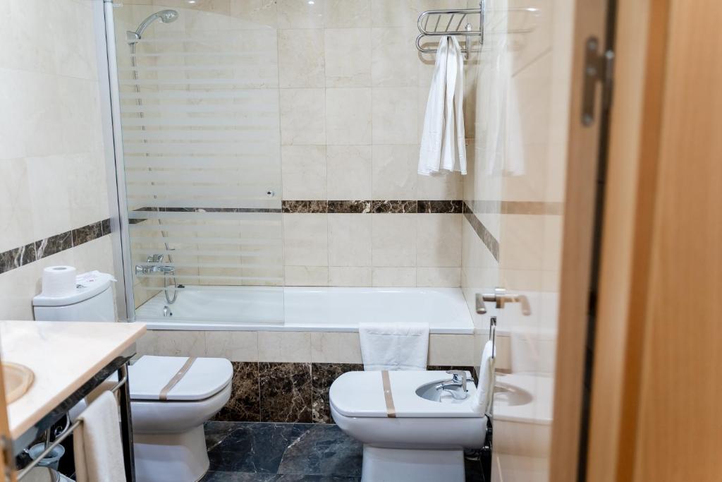 Koupelna v ubytování Hotel Malena