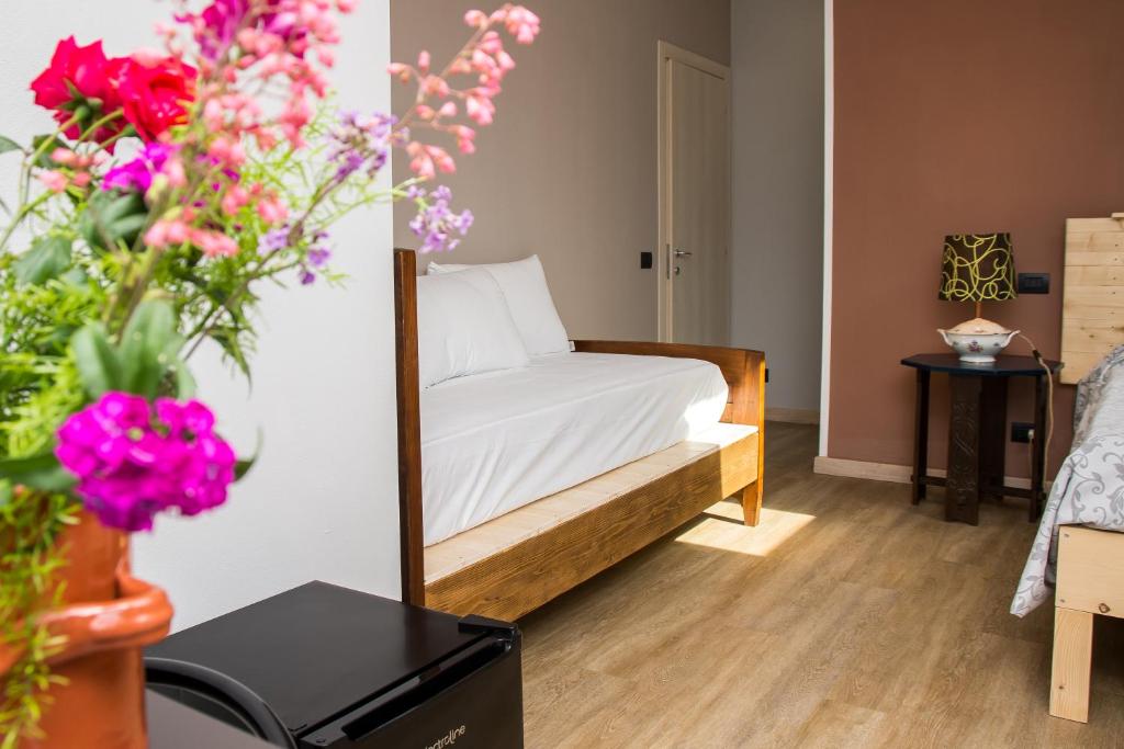 Posteľ alebo postele v izbe v ubytovaní B&B Miellò nelle Langhe