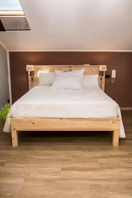 Posteľ alebo postele v izbe v ubytovaní B&B Miellò nelle Langhe