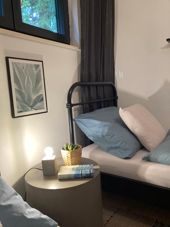 Posteľ alebo postele v izbe v ubytovaní DAS ERWIN Design-Bungalow (Nähe Velden/Wörthersee)
